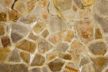 Granit kayalardan oluşan duvarın dokusu. Yapı.