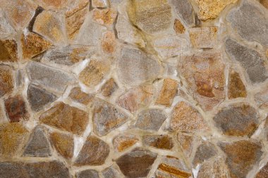 Duvarın dokusu granit taşlardan yapılmış. mimari, dekorasyon.