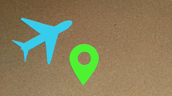 飛行機 茶色の背景に位置記号 — ストック写真