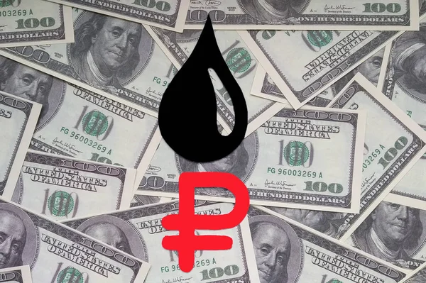 Ruble sign, a drop of oil on the background of us dollar bills. Increase in the price of oil and petroleum products..