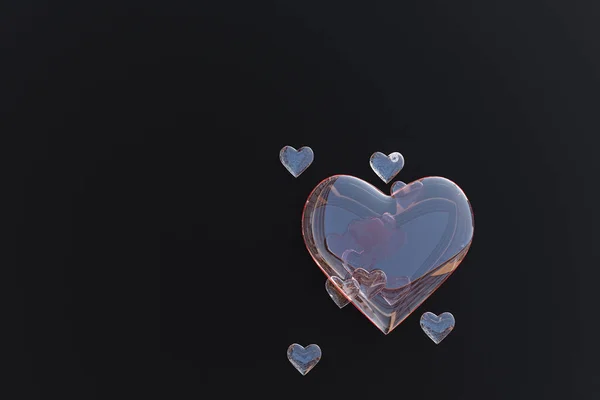 Стеклянное сердце, излучающее дочерние сердца — стоковое фото