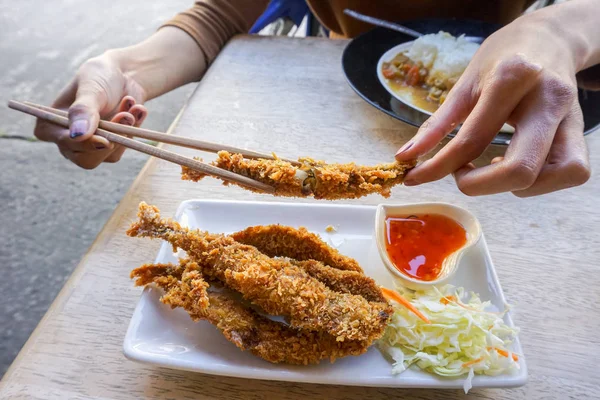 Fish fritter fried with spicy sauce — Stock Photo, Image