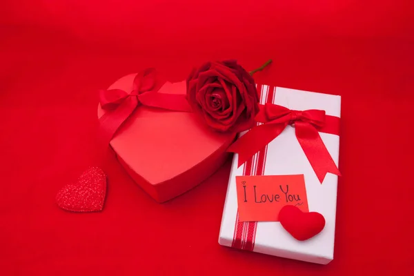 Valentines gift box with a red bow on red background Image of Va — Stock Photo, Image
