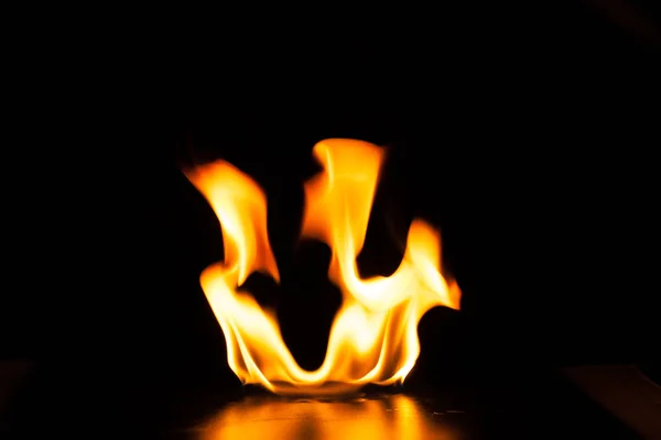 Burning fire flame on black background — Stock Photo, Image