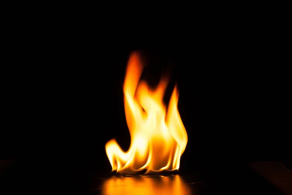 Burning fire flame on black background — Stock Photo, Image