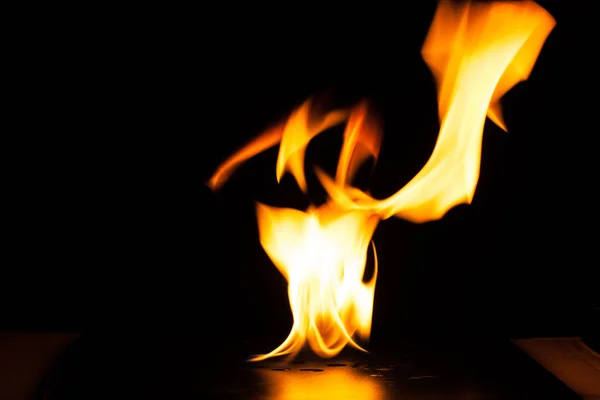 Burning fire flame on black background — Stock Photo, Image