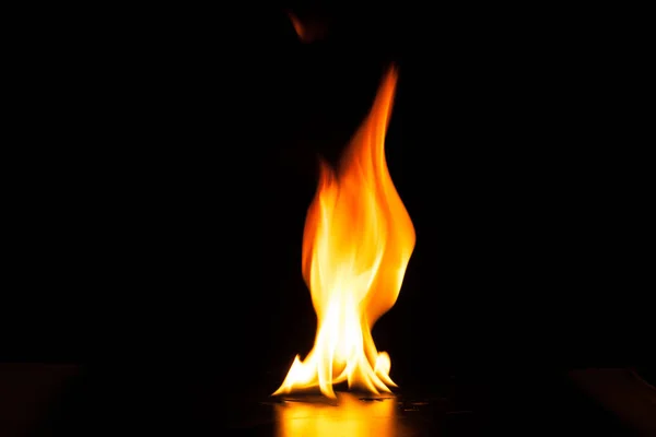 Burning fire flame on black background — Stock Photo, Image