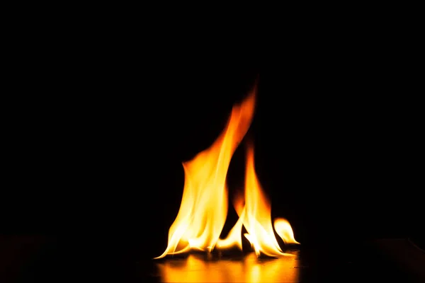 Burning fire flame on black background — Stock Photo, Image