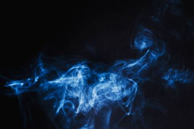 Abstract  Blue Smoke on black background clipart