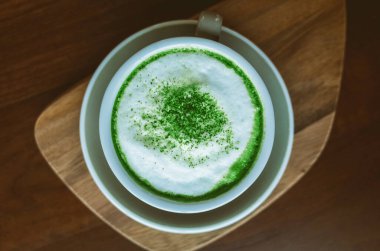 Bir bardak kibrit tozu ile iç.