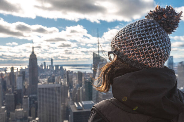 Woman enjoying amazing view of New York City skyline