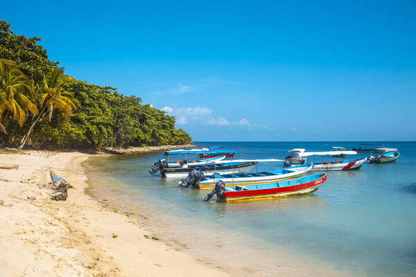 Tela, Honduras - January 2020: transport boats on Tela beach
