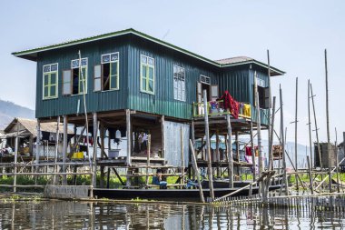 Inle Lake, Myanmar - Spring, 2018:  beautiful blue house on Inle Lake