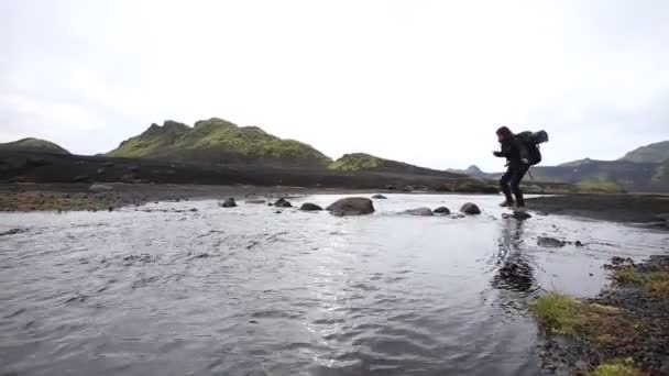 Young Woman Crossing Cold River Landmannalaugar Trek Iceland — Stock Video