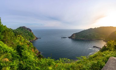 Panoramic of the bay of Pasajes from Monte Ulia of the city of San Sebastian at sunrise, Gipuzkoa. Basque Country clipart