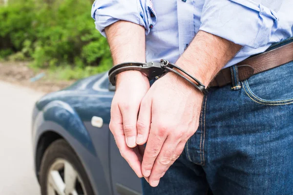 Bussinessman in handcuffs — Stock Photo, Image