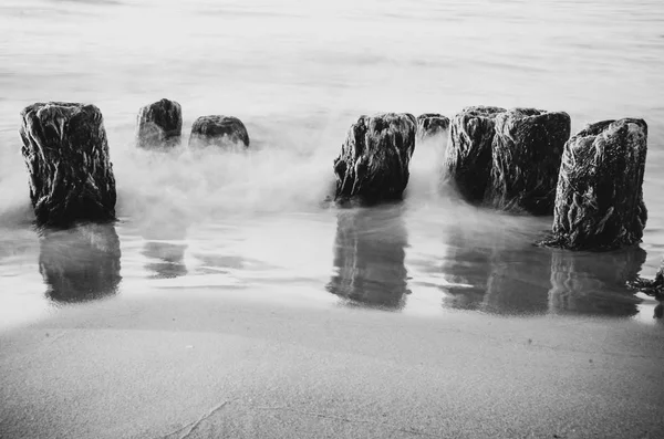 Polish sea of breakwaters and sand dunes. — Stock Photo, Image