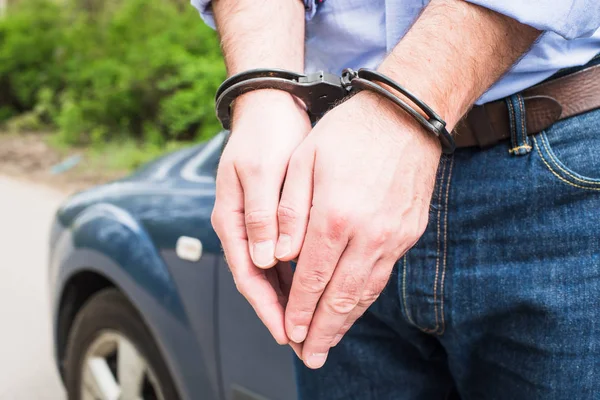 Bussinessman in handcuffs — Stock Photo, Image