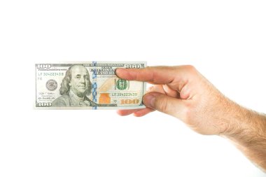 Para birimi bize dolar. Para ile sabitlenmiş bir avuç.