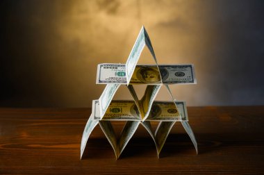 Financial Pyramide. The financial pyramid of dollars.