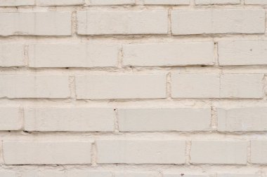 Pastel renklerle boyanmış tuğla duvar