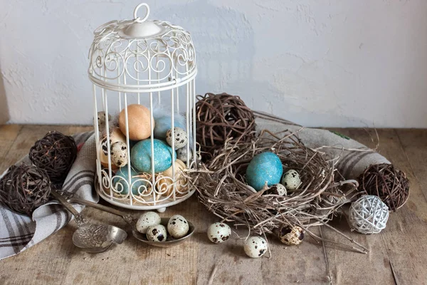 Painted Quail Eggs Decorative Cage Nest Old Wooden Table — Stock Photo, Image