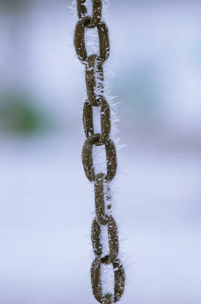 Iron chain covered with frost. — Stock Photo, Image