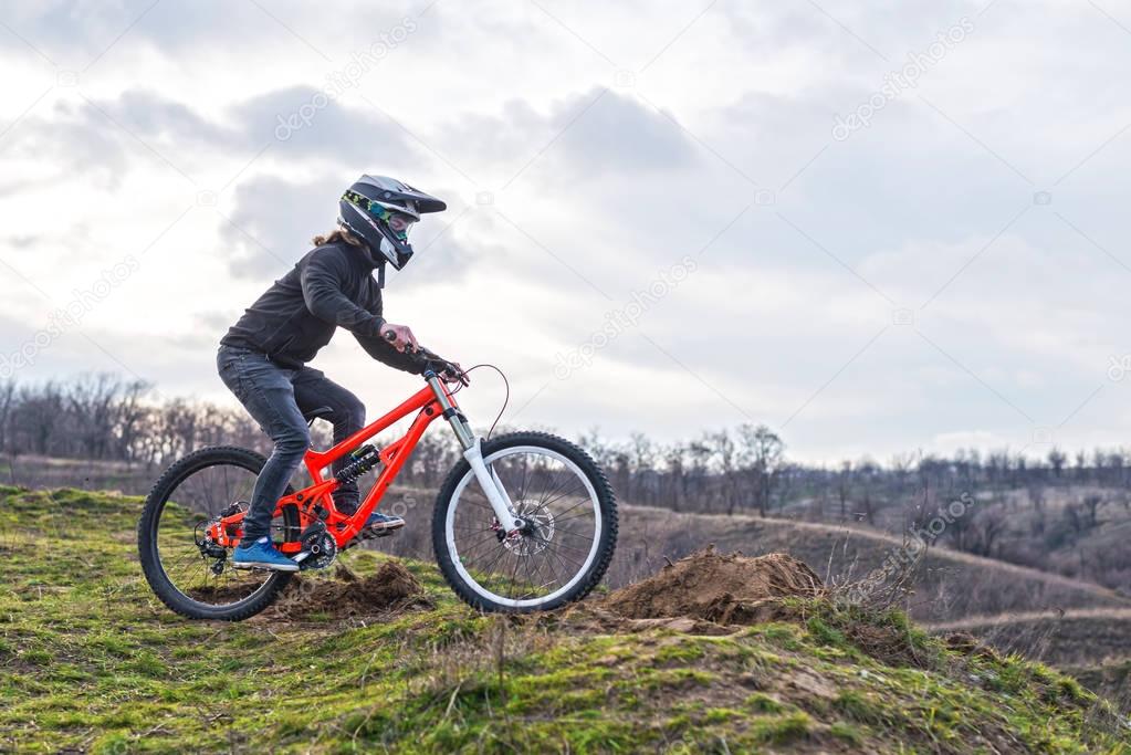 Cyclist on the mountain bike, free space for your text.