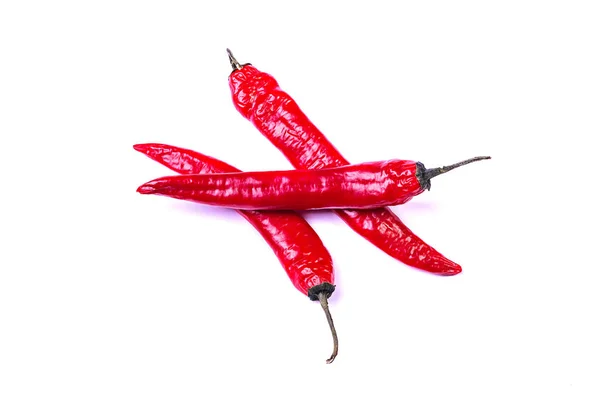 Három red hot chili paprika elszigetelt fehér background — Stock Fotó