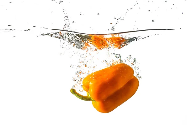 Orange Pepper Thrown Water White Background Concept Healthy Food Diet — Stock Photo, Image
