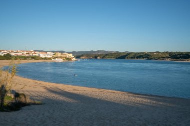 View of Vila Nova de Milfontes beach and city with river Mira, in Portugal