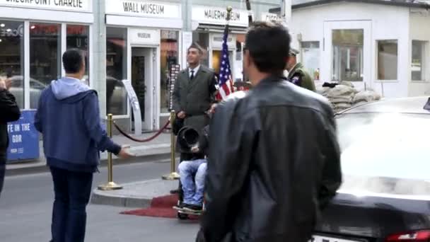 Man Wheelchair Taking Photos Having Fun Soldiers Uniform Checkpoint Charlie — Stock Video