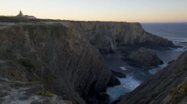 Cabo do Sardao Lighthouse Cape view at sunrise, in Portugal