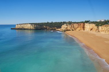 Nossa Senhora da Rocha Sahili, gün batımında Algarve, Portekiz