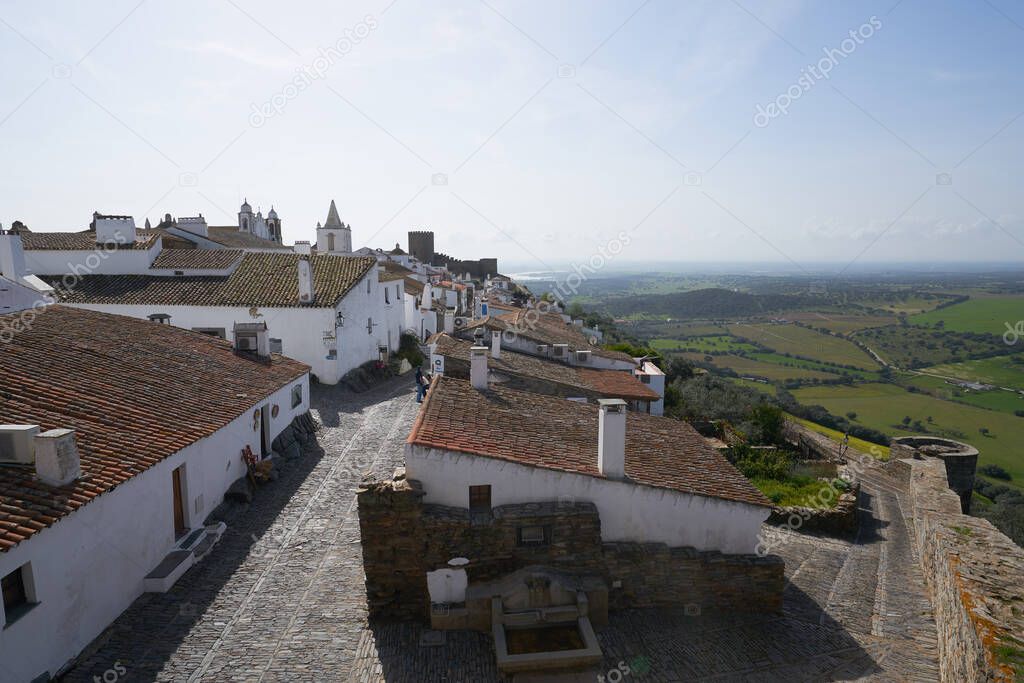 Monsaraz village street with white houses in Alentejo, Portugal