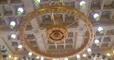 Muslims praying inside haram Masjid (mosque) Nabawi in Al Madinah, Saudi Arabia