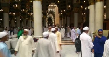 Muslims praying inside haram Masjid (mosque) Nabawi in Al Madinah, Saudi Arabia