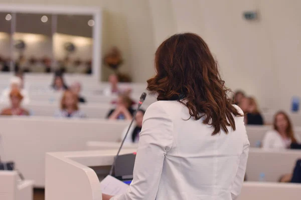 Business woman as leader speaking at Conference. Audience at the — Stock Photo, Image