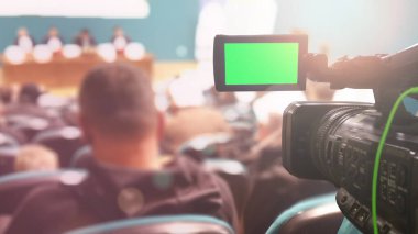 Dijital video kamera kayıt olayı. İş konferansı veya sem