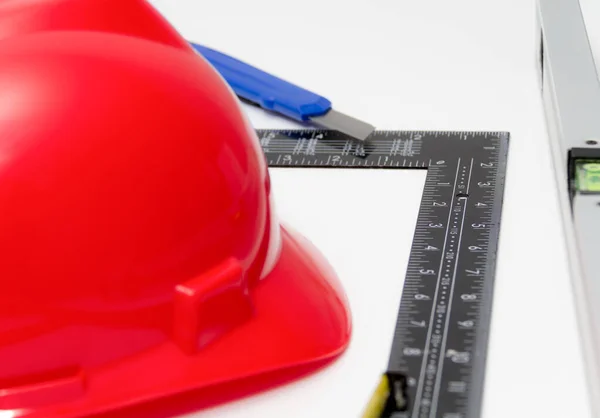 Helmu a nářadí pro stavební výkresy a budovy — Stock fotografie