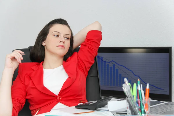 Beautiful business woman dreaming while working on computer at h