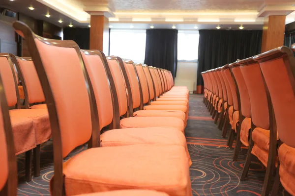 Conference hall or seminar room, row of empty seat in auditorium or hall or classroom.