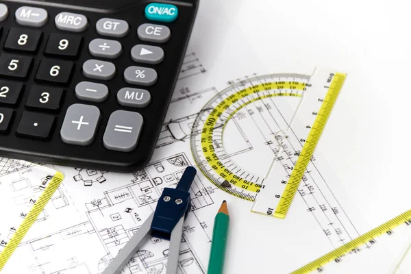 Architectural project, pair of compasses, rulers and calculator — Stock Photo, Image