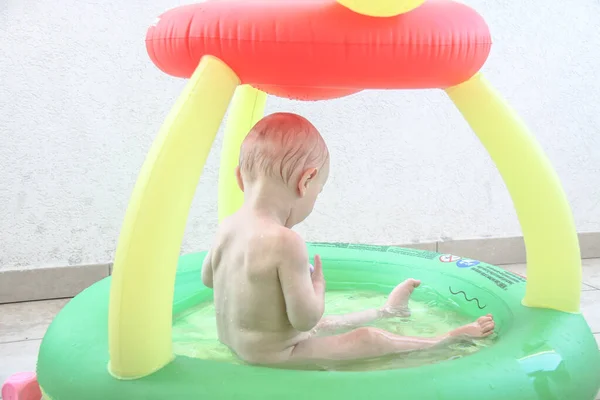 Beautiful baby boy, five months old playing — стоковое фото