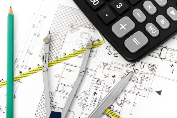 Architectural project, pair of compasses, rulers and calculator — Stock Photo, Image