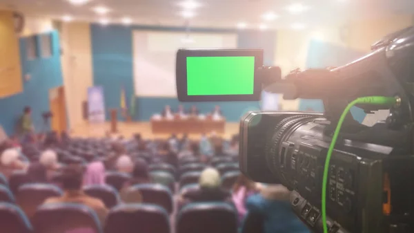 Digitale videocamera opname evenement. Bedrijfsconferentie of -bijeenkomst — Stockfoto