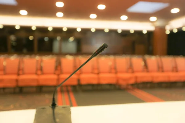 Rostrum with microphone in conference hall