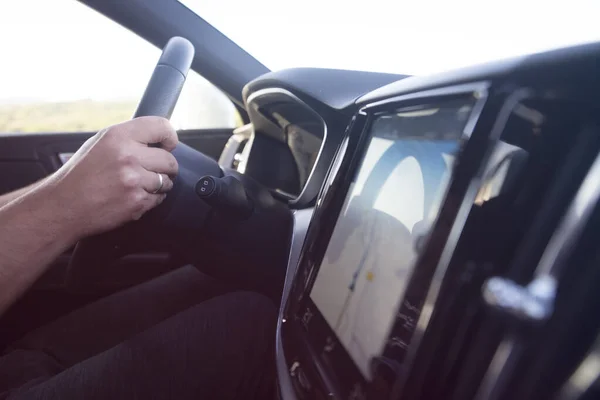 Businessman driving a car. Success in motion. Handsome young man — Stock Photo, Image