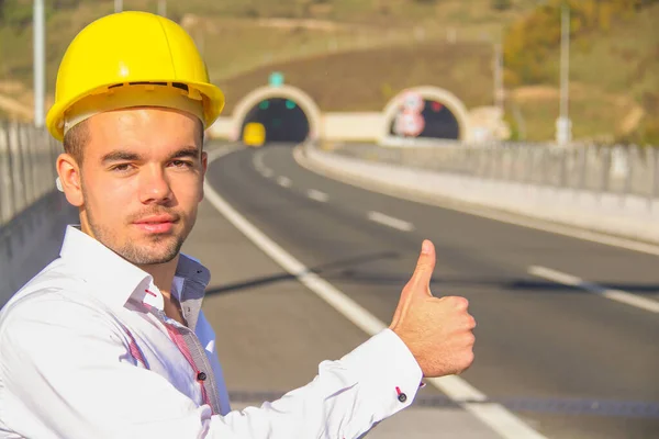 Young engineer near the tunnel