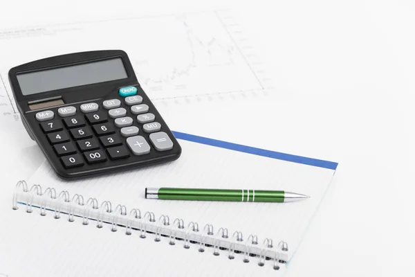 Concepto de negocio con calculadora, pluma y cuaderno — Foto de Stock